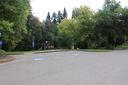 Parking lot at the boat launch – accessible parking – curb cut – bench – view of Tualatin River
